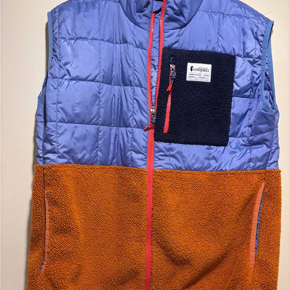 Cotopaxi Blue and Red Puffer Vest with Navy Fleece